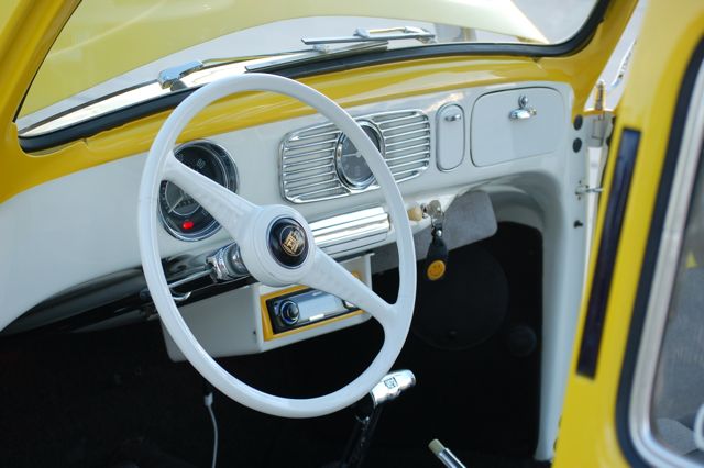 Dashboard is painted in two tone Bat Wing steering wheel under dash audio