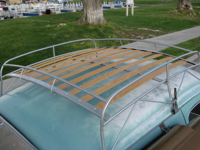 Wood slat roof rack covers the nicely faded roof.